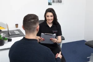 posture assessment during chiropractic consultation